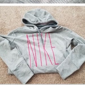 a grey and pink nike hoodie